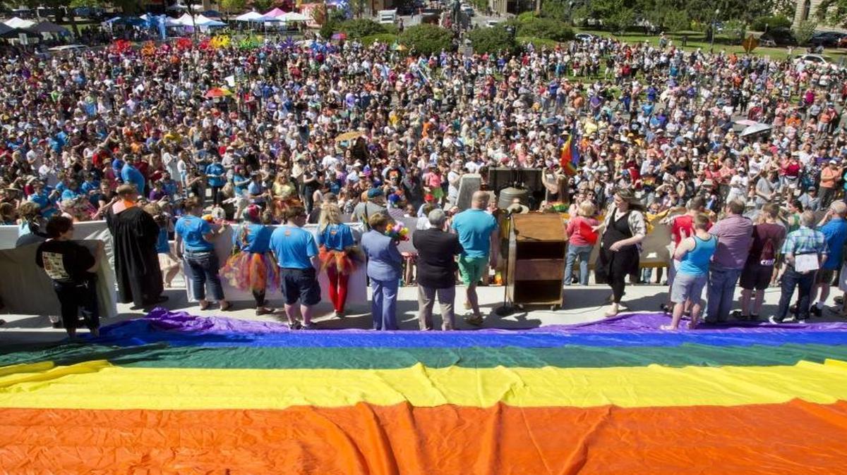 Thousands gather at Capitol Park in downtown Boise, Idaho, for the annual PrideFest rally and parade on Saturday, June 18, 2016. Speakers recounted the struggle for LGBT rights and honored the victims of the mass shooting in Orlando, Fla., a week before. A bill in Congress would require federal agencies to gather information on the number of LGBT individuals around the country, information that advocates say would allow better response to health care issues and discrimination.
