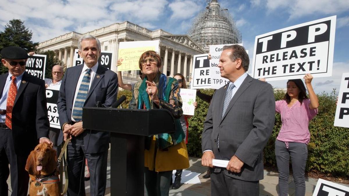 Rep. Rosa DeLauro, D-Conn., center, joined at left by Rep. Lloyd Doggett, D-Texas, Rep. David Cicilline, D-R.I., right, and other members of Congress, speaks at a news conference in Washington, Thursday, Oct. 29, 2015, about the details of the Trans-Pacific Partnership.