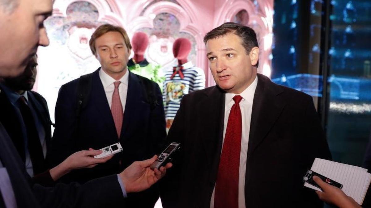 Sen. Ted Cruz, R-Texas, pauses to talk with media as he leaves Trump Tower, Nov. 15, 2016, in New York.