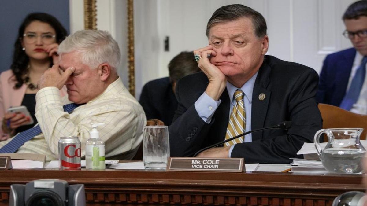 After eight hours of debate, House Rules Committee Chairman Pete Sessions, R-Texas, left, and Rep. Tom Cole, R-Okla., the vice chair, listen to arguments from committee chairs as the panel meets to shape the final version of the Republican health care bill before it goes to the floor for debate and a vote, March 22, 2017, on Capitol Hill in Washington.