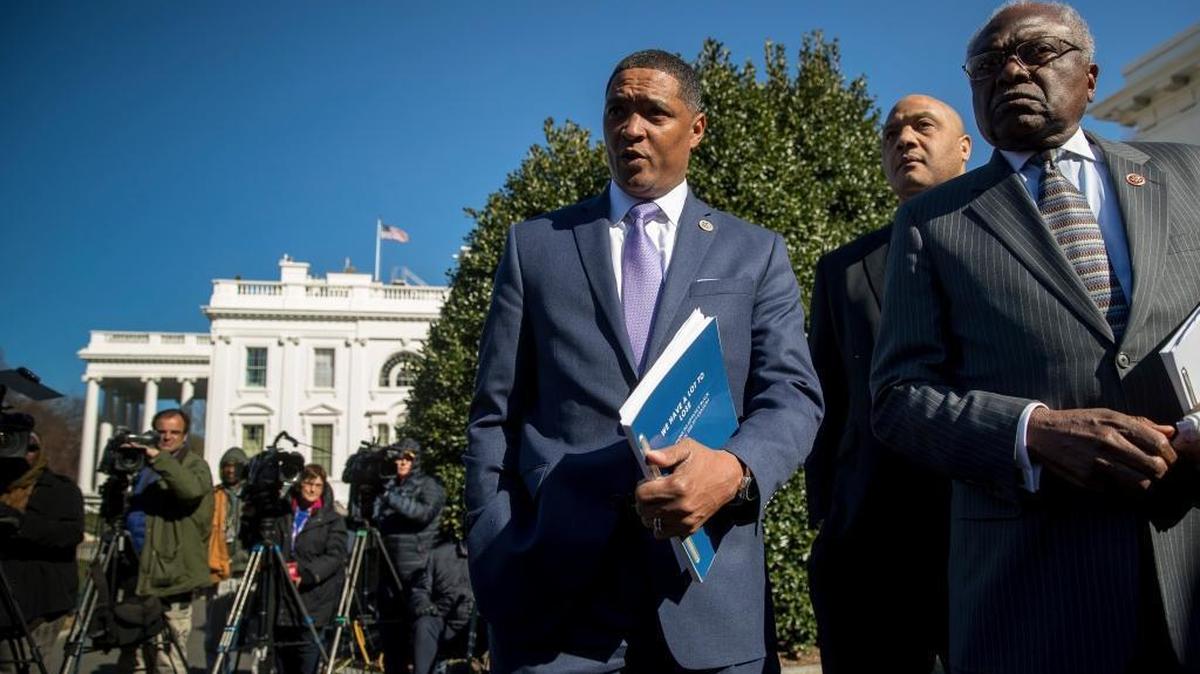 Rep. Cedric Richmond, D-La., the chairman of the Congressional Black Caucus, center, accompanied Rep. Andre Carson, D-Ind., second from right, and Rep. Jim Clyburn, D-S.C., right, speak to members of the media after they and other members of the Congressional Black Caucus meet with President Donald Trump in the Cabinet Room of the White House, Wednesday, March 22, 2017, in Washington.