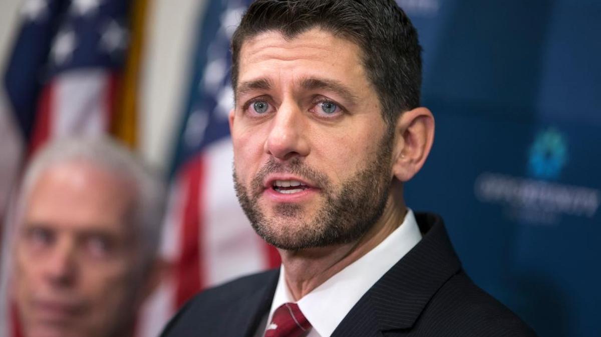 House Speaker Paul Ryan of Wis., accompanied by Rep. Bill Johnson, R-Ohio, a member of the House Energy and Commerce Committee, meet with reporters following a GOP strategy session on Capitol Hill in Washington, Tuesday, Dec. 1, 2015. Ryan sports a beard man, showing off plenty of facial hair in what his office called his "hunting beard" that he began growing Saturday at "deer camp."