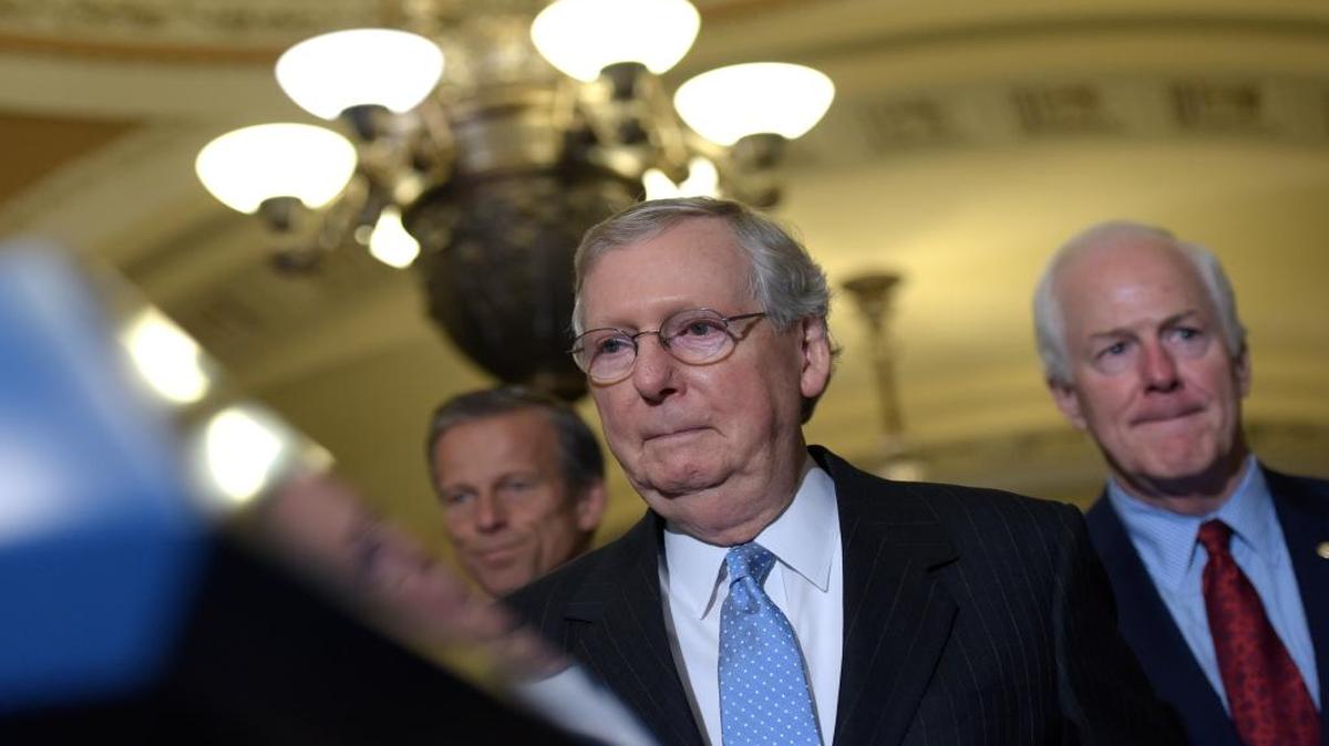 Senate Majority Whip John Cornyn of Texas (right), Senate Majority Leader Mitch McConnell, R-Ky., center, and Sen. John Thune, R-S.D., arrive for a media availability on Capitol Hill in Washington on Tuesday, Sept. 13, 2016.