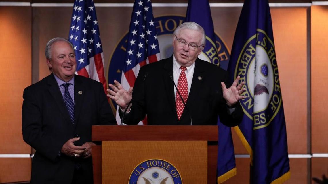 Rep. Mike Doyle, D-Pa., left and Rep. Joe Barton, R-Texas meet with reporters on Capitol Hill in Washington.