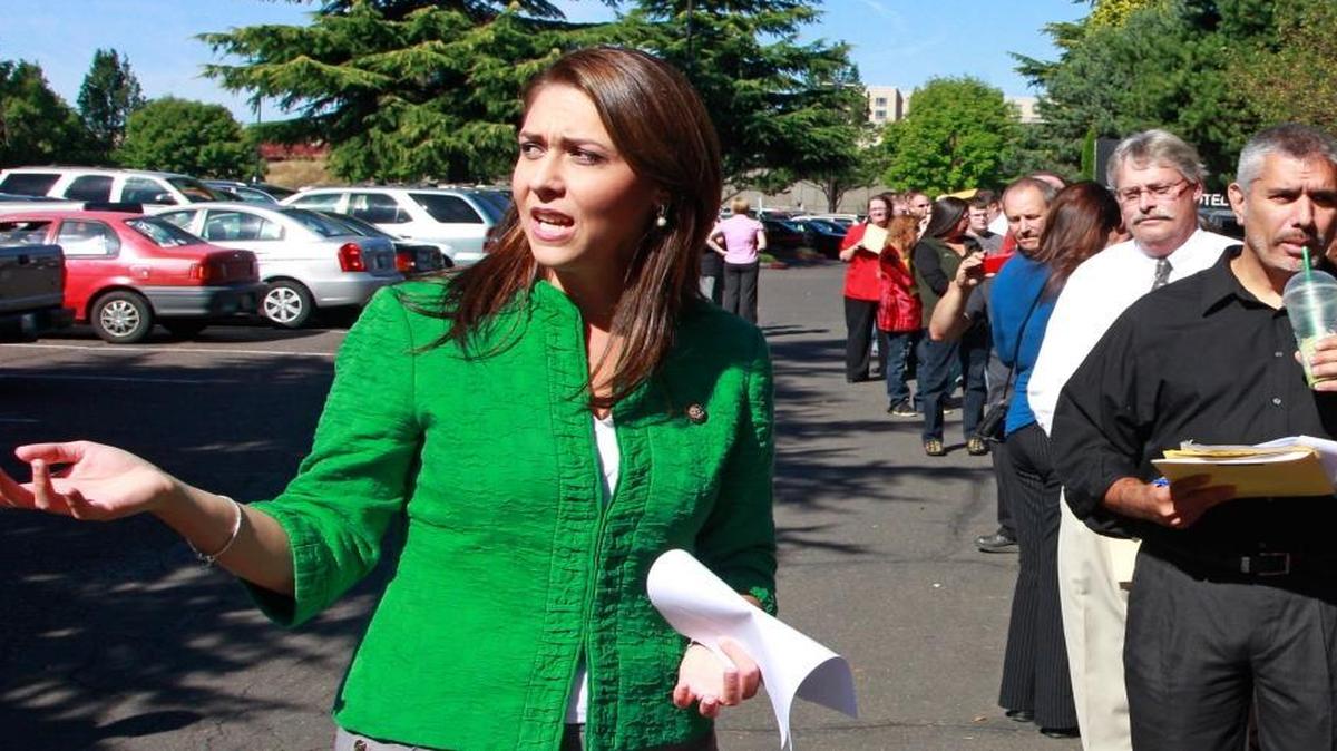 Washington state Republican Rep. Jaime Herrera Beutler on Monday called for a federal investigation after learning that a veteran from southwestern Washington had died in December after his cancer treatment was delayed by three months. She’s shown here speaking with constituents at a job fair.