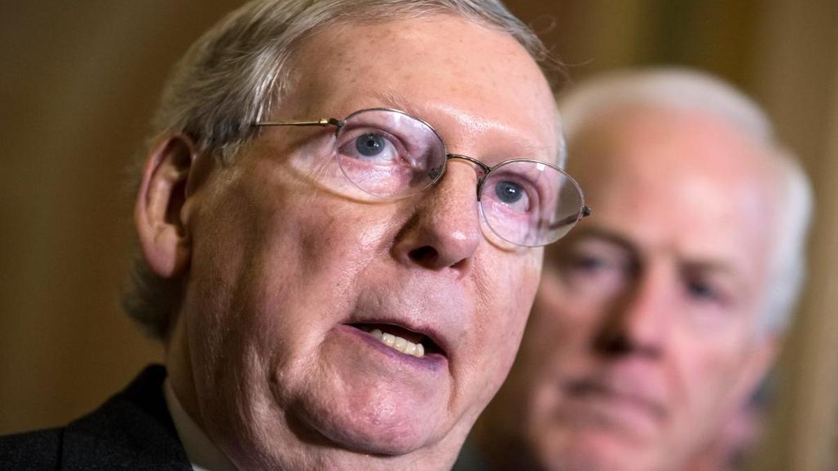 In this Dec. 1, 2015, photo, Senate Majority Leader Mitch McConnell of Kentucky, joined by Senate Majority Whip John Cornyn of Texas, tells reporters he’s confident he’ll have enough support for an effort to repeal the Affordable Care Act this week.