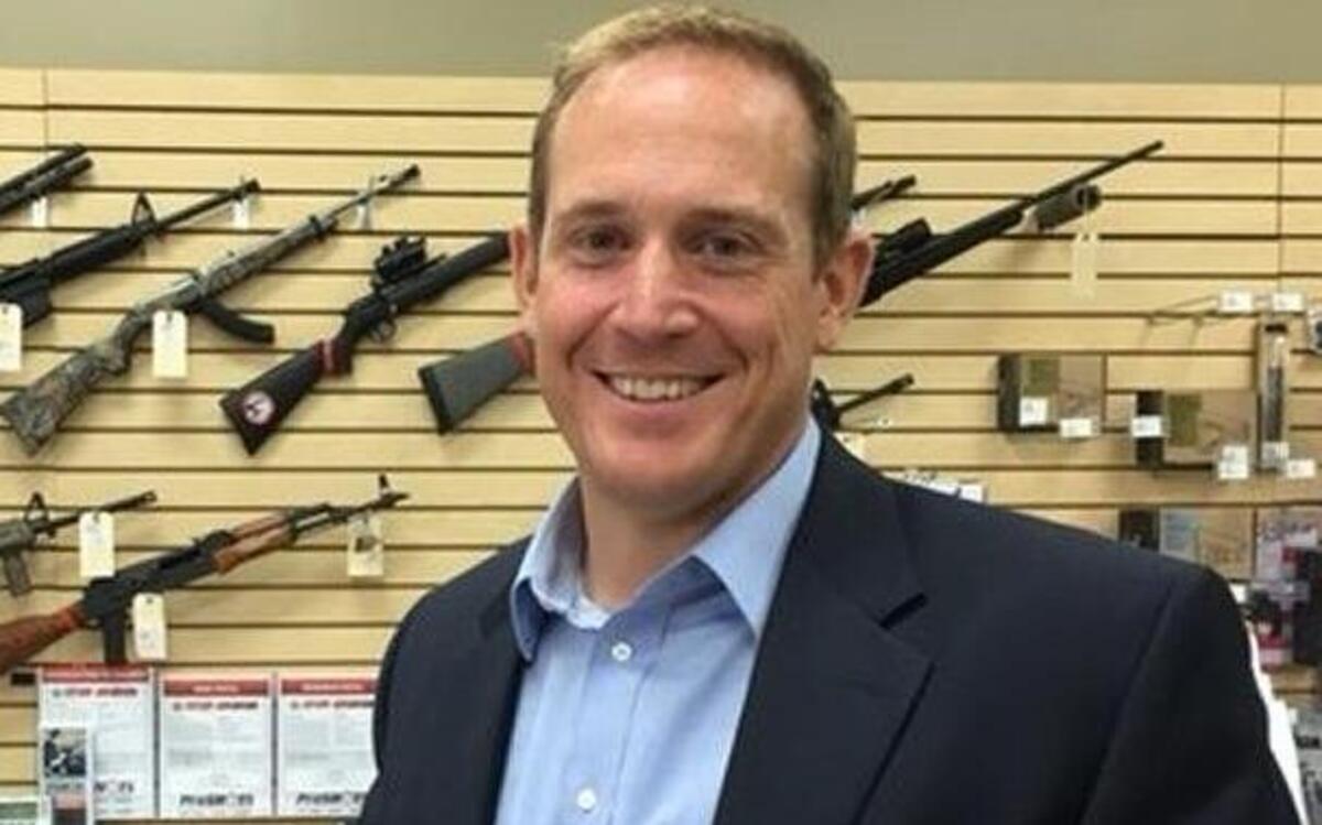 GOP congressional candidate Ted Budd in his gun store. He won the five-county 13th District primary with just 6,340 votes.