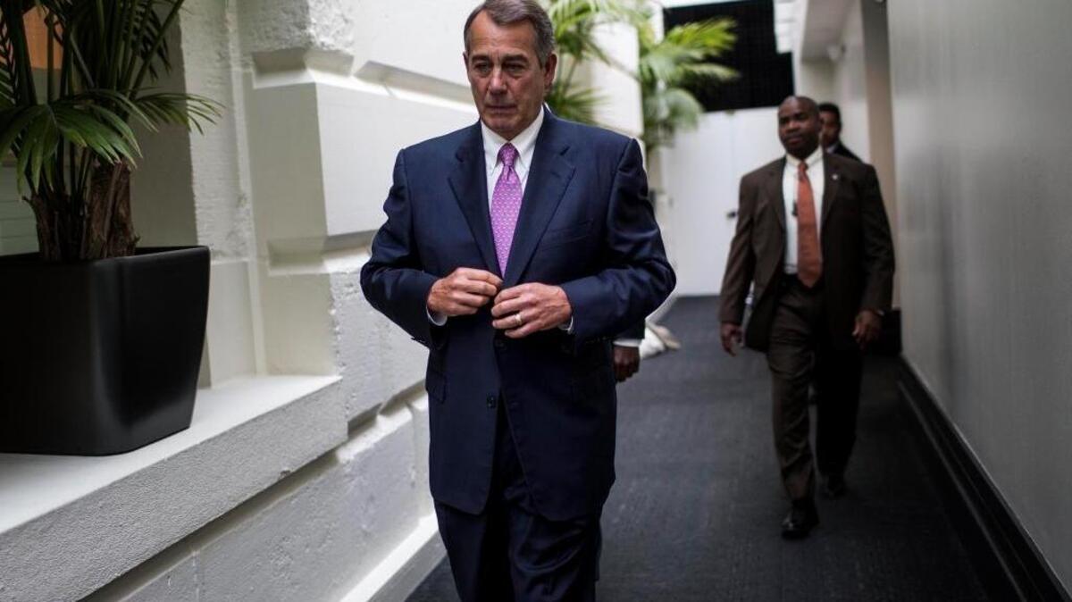 Speaker of the House John Boehner leaves his last weekly press conference on Oct. 27, 2015, with tears in his eyes.