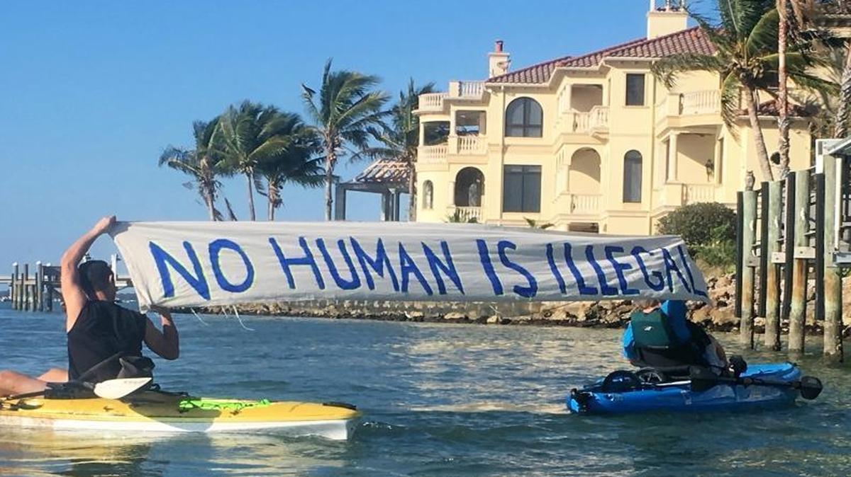 Grass-roots activists in Sarasota, Fla., protest at a fundraiser for California Rep. Darryl Issa on May 7, 2017. Issa doesn’t represent them, but at the request of some of his constituents in the San Diego area, they showed up with signs and noisemakers. Some of the protesters arrived by kayak, while others met Issa, Florida Sen. Marco Rubio and other attendees in front of the waterfront home where the fundraiser took place.