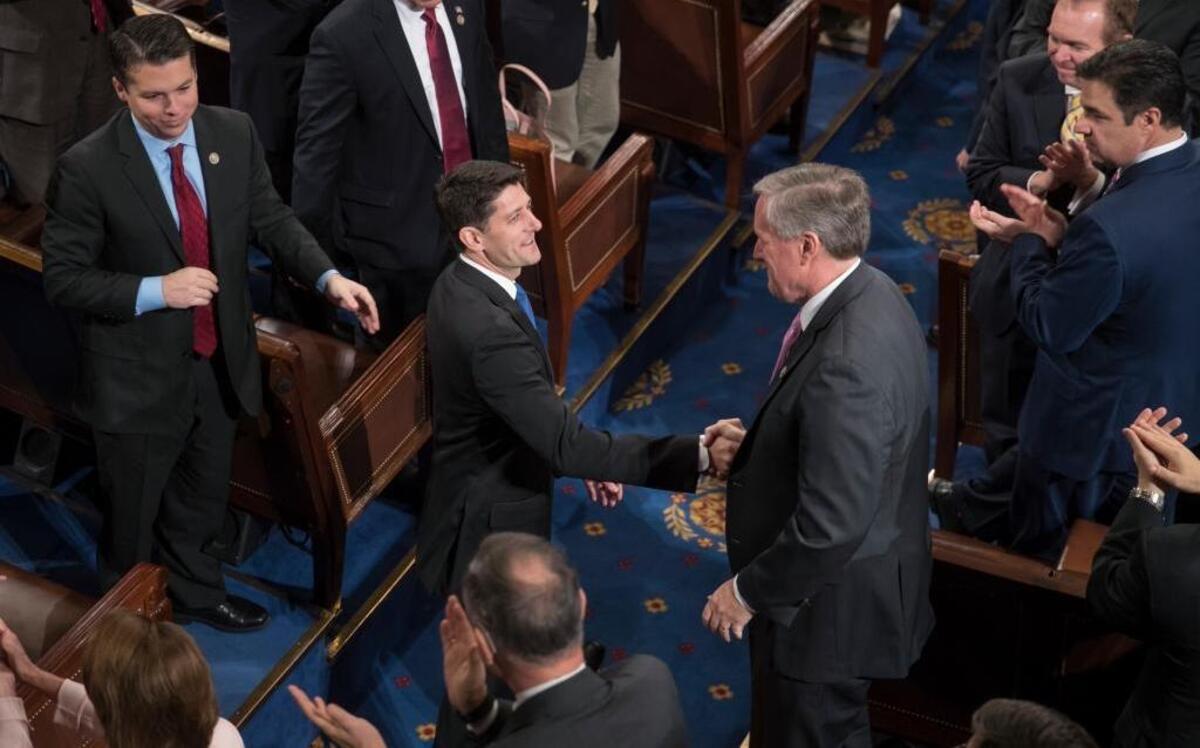 FILE – Republican House Speaker Paul Ryan of Wisconsin shakes hands with Rep. Mark Meadows, R-N.C., right, as Ryan is applauded following his re-election as speaker on Tuesday, Jan. 3, 2017. Meadows and the House Freedom Caucus met Monday night to decide the group’s stance on how and when to repeal and replace the Affordable Care Act, also known as Obamacare.