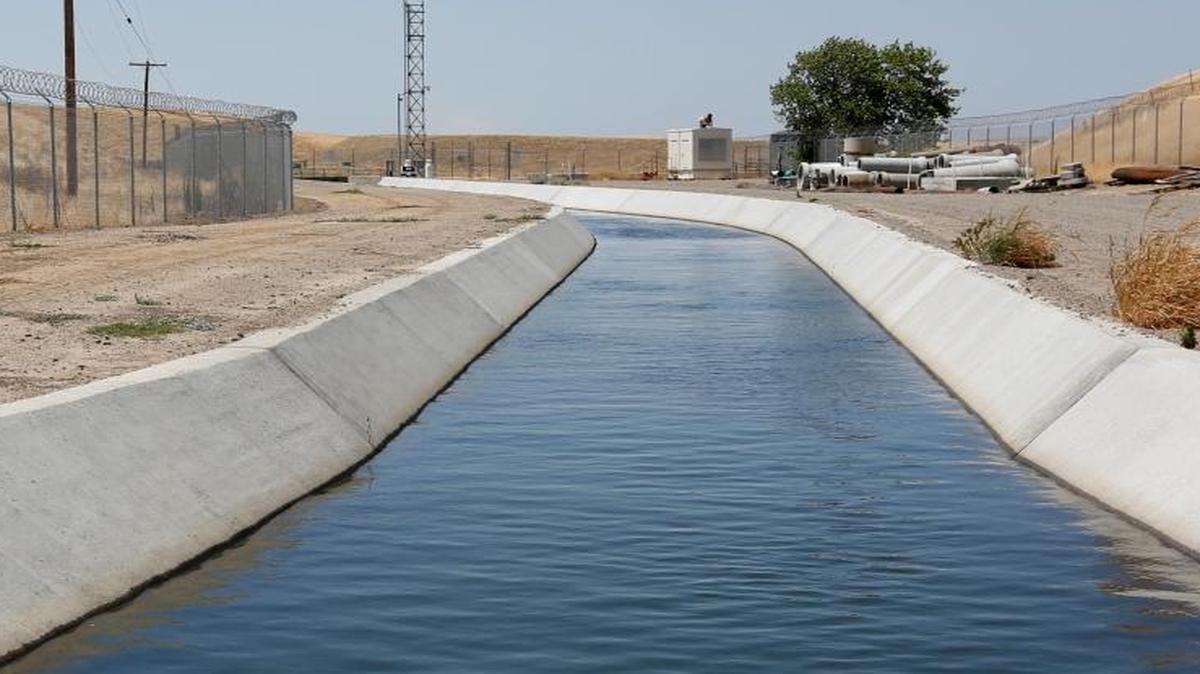 A diversion canal operated by the Byron-Bethany Irrigation District near Byron, California.