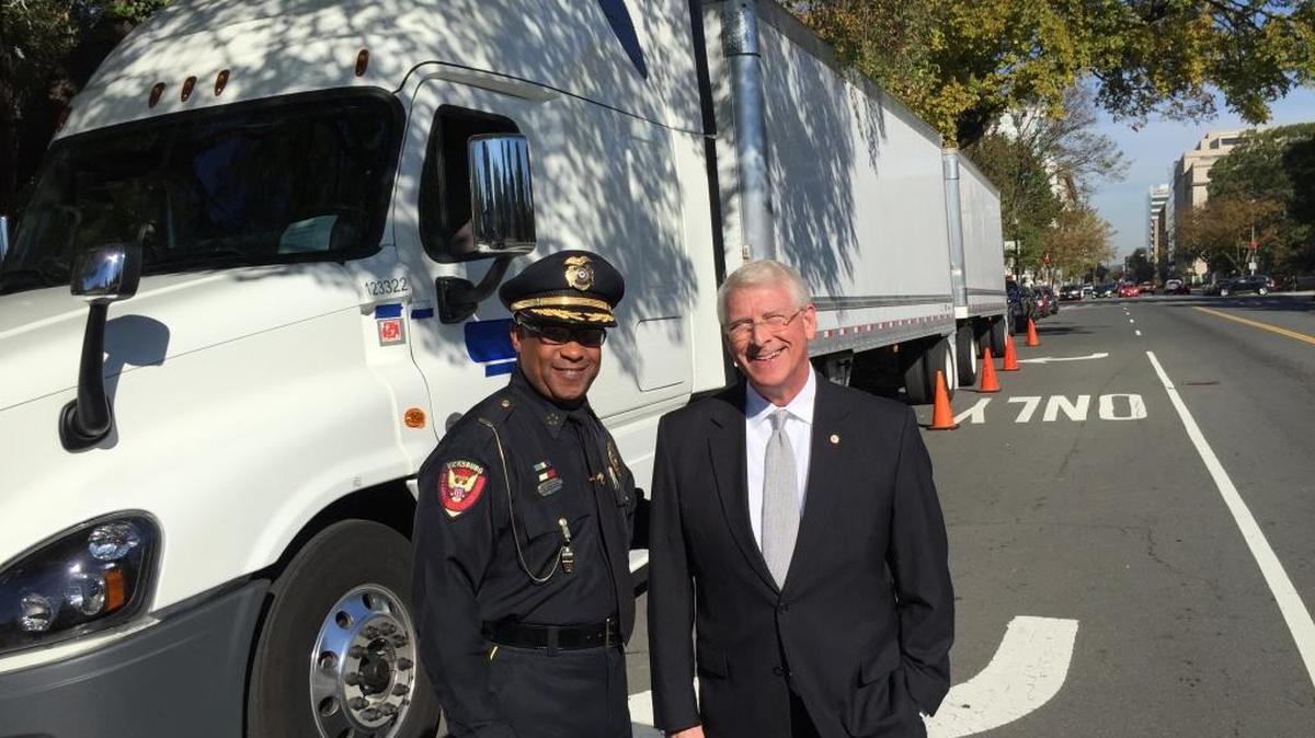 Mississippi Sen. Roger Wicker stood with Vicksburg, Miss., Police Chief Walter Armstrong beside a truck hooked to two 33-foot semitrailers outside the U.S. Capitol on Oct. 21, 2015. Wicker and a bipartisan coalition are aiming to block legislation that would extend to a maximum of 91 feet the length of trucks on all the nation's roads.