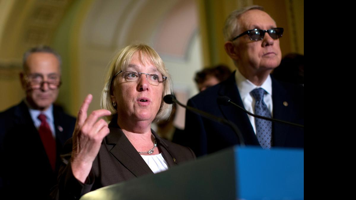 
Sen. Patty Murray, D-Wash., center, is one of the leading backers of a plan to expand overtime pay for an estimated 5 million Americans, including 90,000 in Washington state. Here she's joined by Sen. Charles Schumer, D-N.Y., left, and Senate Minority Leader Harry Reid of Nev., right, speaking to the media at the U.S. Capitol on July 8, 2015.

