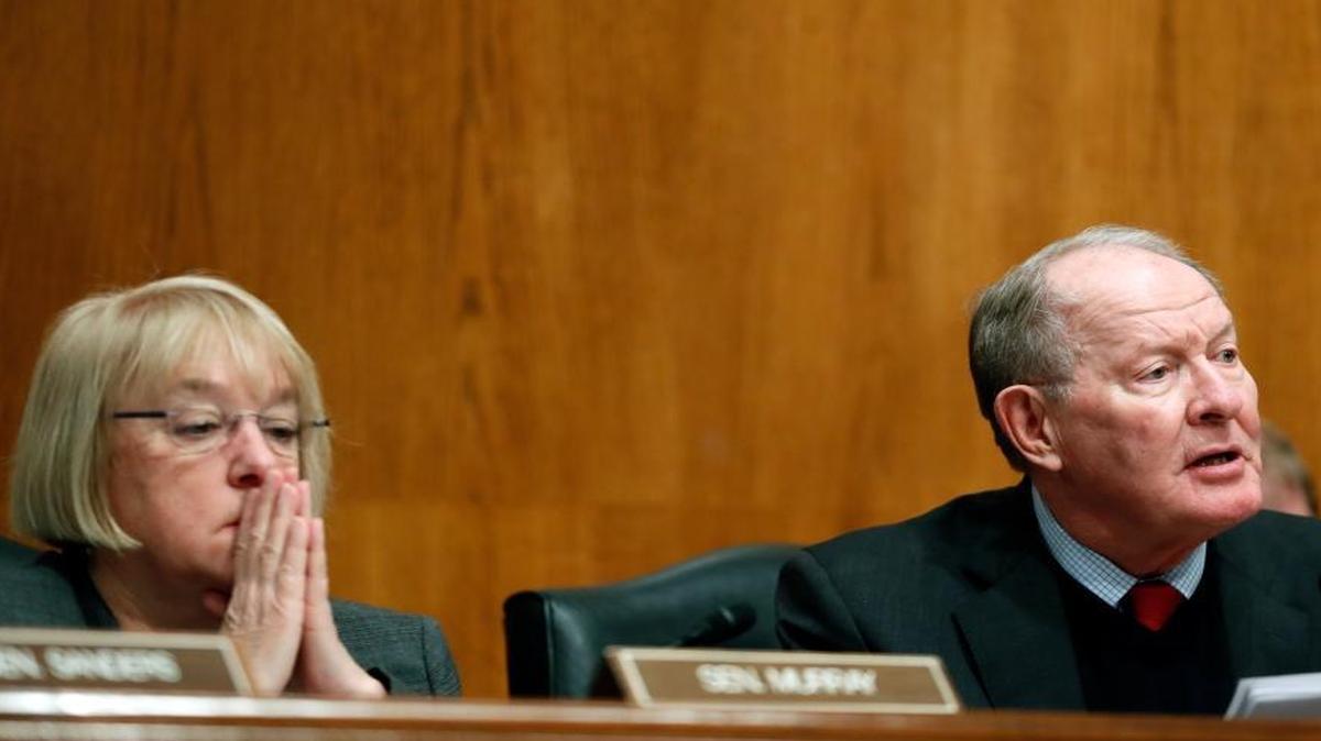 Senate Health, Education, Labor and Pensions Committee Chairman Sen. Lamar Alexander, R-Tenn., accompanied by the committee's ranking member, Sen. Patty Murray, D-Wash. speaks on Capitol Hill in Washington, on Tuesday, Jan. 31, 2017, during the committee's executive session to discuss the nomination of Education Secretary-designate Betsy DeVos.
