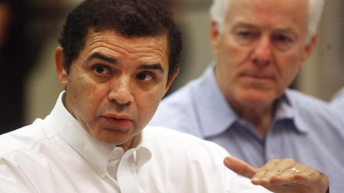 Rep. Henry Cuellar, D-Texas, left, along with Sen. John Cornyn, R-Texas, shown in this July 18, 2014, file photo, is the top Democratic recipient of oil and gas industry campaign donations in Congress. Cuellar says he votes in the interests of his district, not by ideology or special interest.