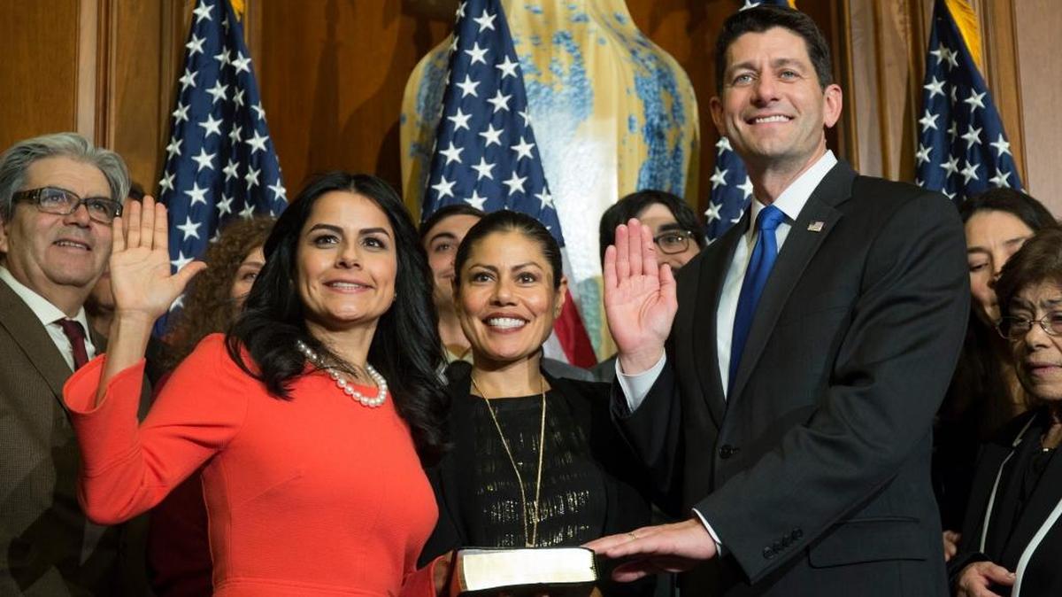 House Speaker Paul Ryan of Wis. administers the House oath of office to Rep. Nanette Barragan, D-Calif., during a mock swearing in ceremony on Capitol Hill, Tuesday, Jan. 3, 2017, in Washington.