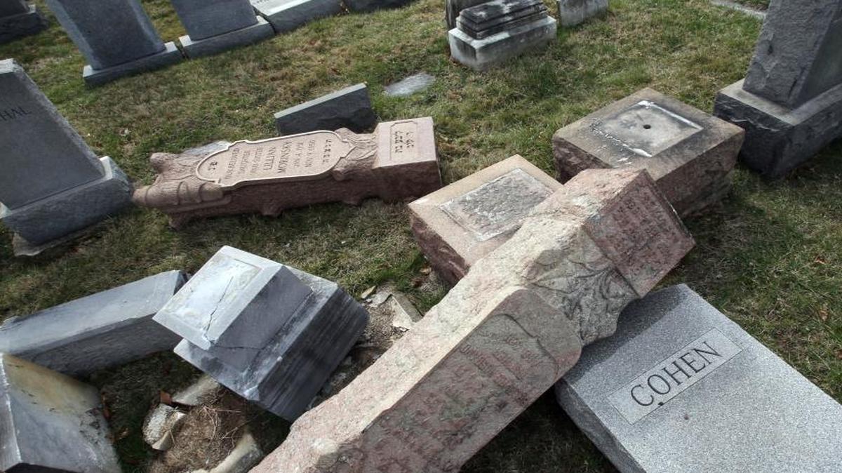 Damaged headstones at Mount Carmel Cemetery on Feb. 27, 2017, in Philadelphia. More than 100 headstones have been vandalized at the Jewish cemetery, damage discovered less than a week after similar vandalism in Missouri, authorities said.