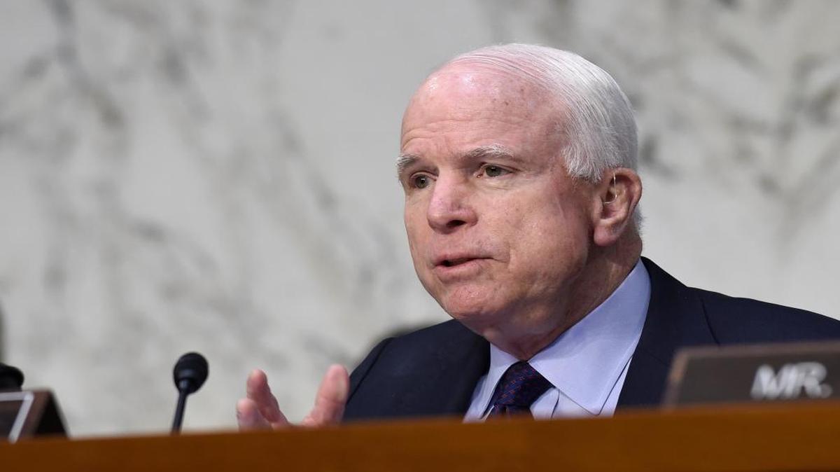 Senate Armed Services Committee Chairman Sen. John McCain, R-Ariz., paid off his bet with Sen. Thom Tillis, R-N.C., on the outcome of the Carolina Panthers-Arizona Cardinals NFC championship game. McCain wore a Carolina blue tie and spoke glowingly about the Super Bowl-bound Panthers on the Senate floor Monday.