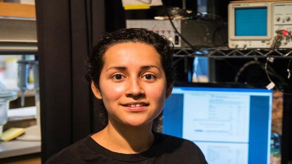 Yuriana Aguilar, 26, of Fresno, then a Quantitative Systems Biology program Ph.D. student at the University of California, Merced, poses for a photo inside her lab at UC Merced, May 12, 2016.