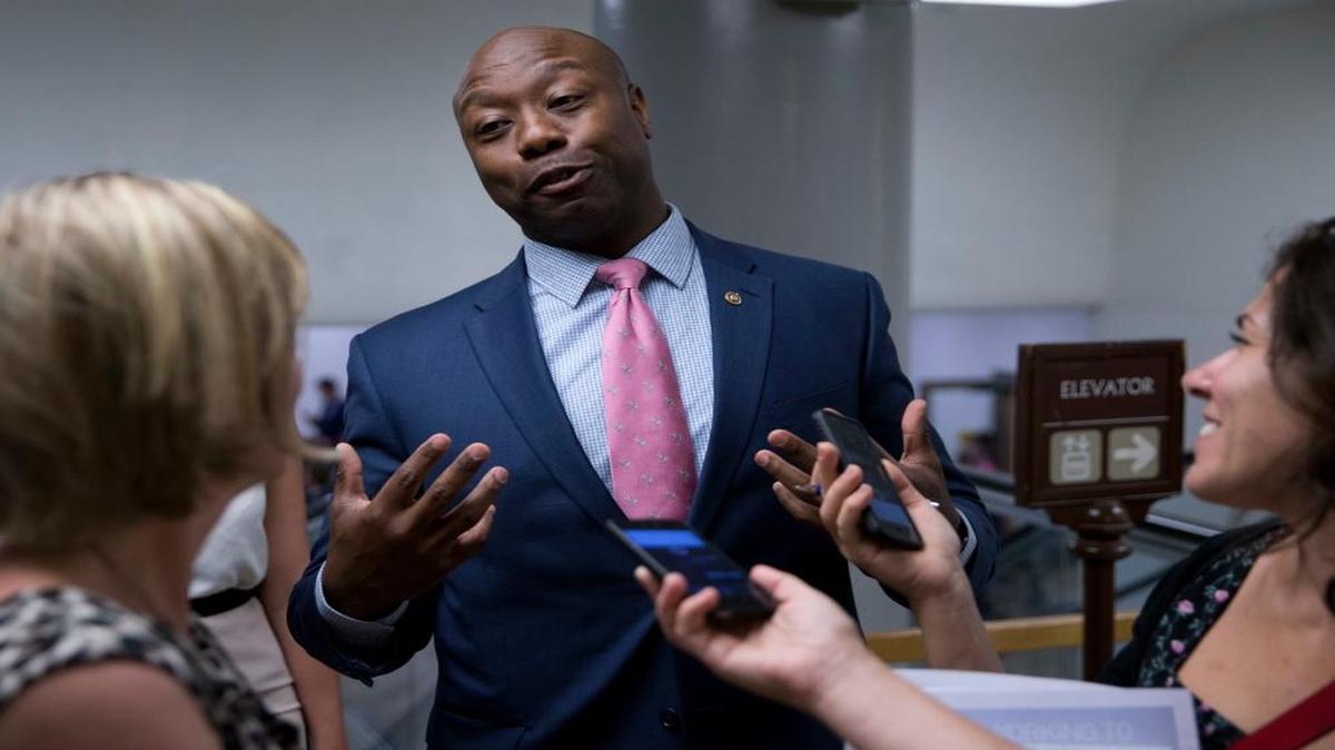 FILE - In this June 21, 2016, file photo, Sen. Tim Scott, R-S.C., talks with reporters on Capitol Hill in Washington. Scott, one of just two black members of the U.S. Senate and the only black Republican, said July 13 he has been repeatedly pulled over by law enforcement and was once even stopped by a Capitol Police officer who apparently did not believe he was a senator.