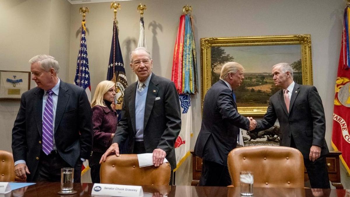 From left, Sen. Lindsey Graham, R-S.C., Secretary of Homeland Security Kirstjen Nielsen, Sen. Chuck Grassley, R-Iowa, President Donald Trump, and Sen. Thom Tillis, R-N.C., arrive for a meeting on immigration in the Roosevelt Room at the White House, Thursday, Jan. 4, 2018, in Washington.