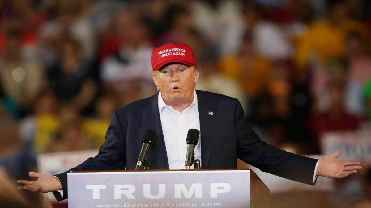 Then-candidate Donald Trump speaks during a campaign pep rally, Friday, Aug. 21, 2015, in Mobile, Ala.