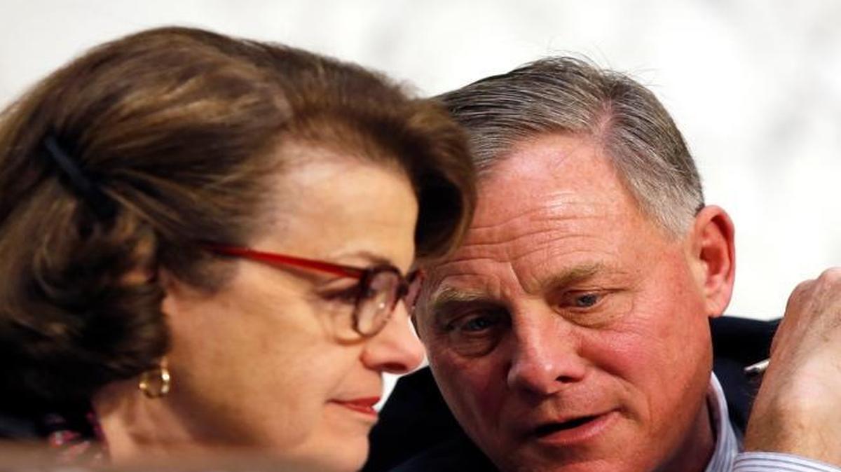 In this Feb. 9, 2016 file photo, Senate Intelligence Committee Vice Chair Sen. Dianne Feinstein, D-Calif., talks with committee chairman Sen. Richard Burr, R-N.C. on Capitol Hill in Washington. Feinstein and Burr worked together on draft legislation to require companies to help the government access to encrypted data. The bill, however, has never been introduced and is likely dead.