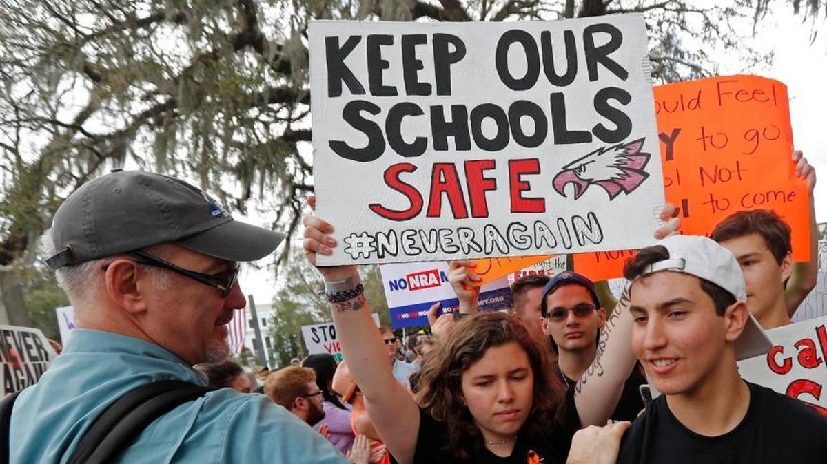 Student survivors from Marjory Stoneman Douglas High School are greeted as they arrive at a rally for gun control reform on the steps of the state Capitol in Tallahassee, Fla.