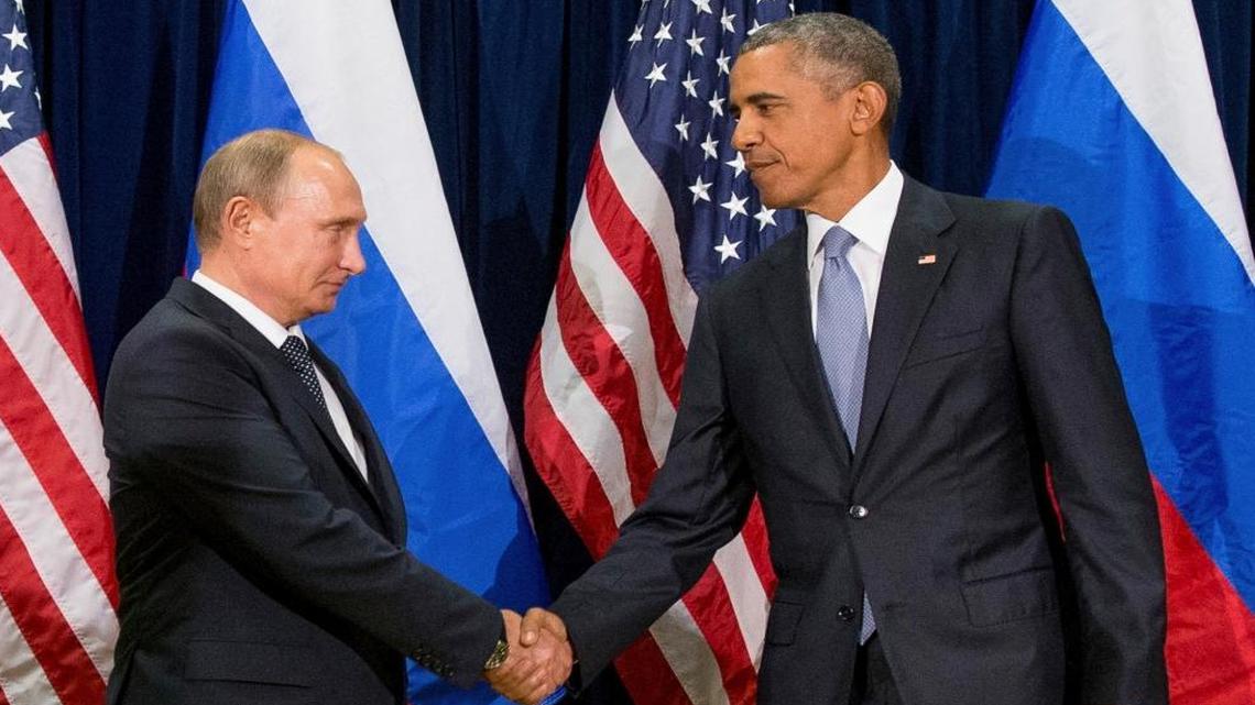In this Sept. 28, 2015, file photo, President Barack Obama shakes hands with Russian President President Vladimir Putin before a bilateral meeting at United Nations headquarters.