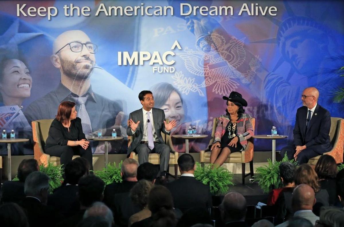Ana Navarro, of CNN moderates a discussion with members of the South Florida Congressional delegation, from left, Republican Carlos Curbelo, and Democrats Frederica Wilson and Ted Deutch during the IMPAC Fund Immigration Summit Agenda at the University of Miami Newman Alumni Center on Tuesday, November 28, 2017.