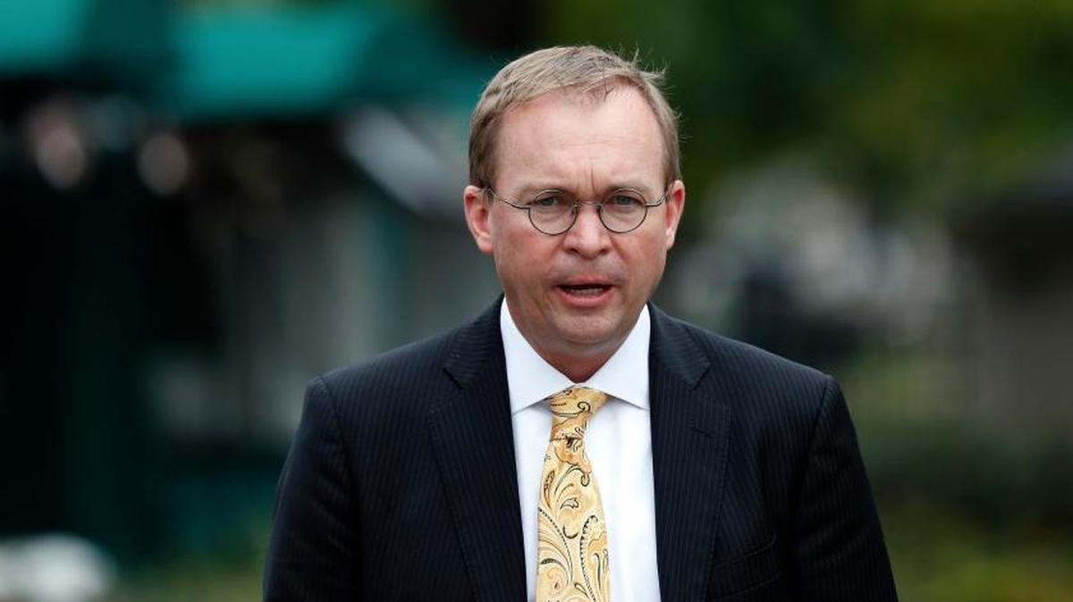 Director of the Office of Management and Budget Mick Mulvaney departs after a television interview at the White House.