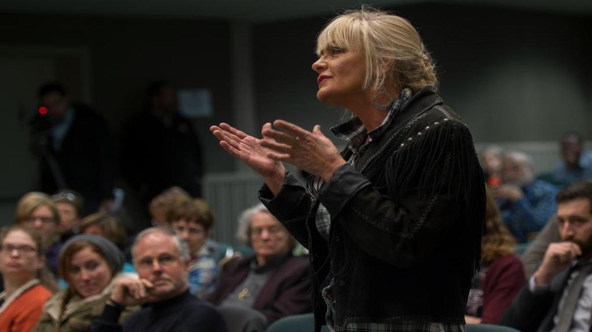 Mary Burwell-Morrongiello of Sonoma, California, repeatedly challenged Rep. Mike Thompson, D-Calif., with outbursts during a hearing on gun control Monday, Dec. 14, 2015, at the state Capitol. “Arm the teachers, arm the people in mental health facilities, and you’ll have less deaths by firearms,” she said at one point. “Arm the citizenry.”