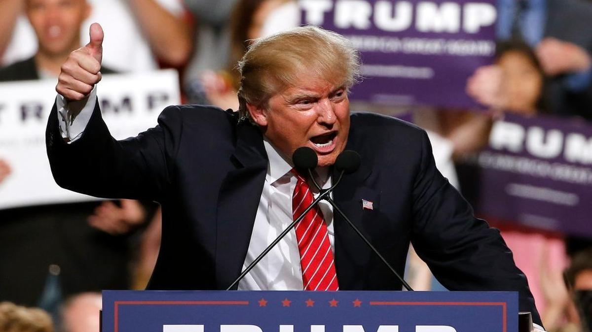 In this July 11, 2015 file photo, then-Republican presidential candidate Donald Trump finishes up speaking before a crowd of 3,500 in Phoenix. Trump was just a few weeks into his candidacy in 2015 when came to Phoenix for a speech that ended up being a bigger moment in his campaign than most people realized at the time. He returned there Tuesday and implicitly criticized Arizona GOP Sen. Jeff Flake.