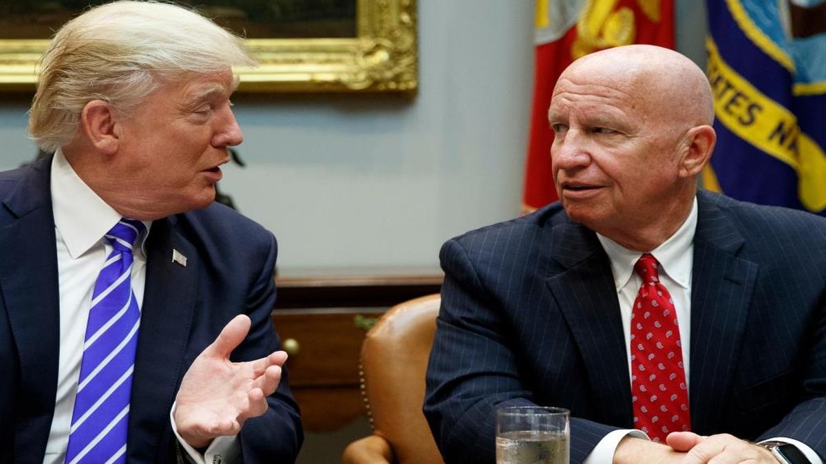 Rep. Kevin Brady, R-Texas, right, listens as President Donald Trump speaks during a meeting with members of the House Ways and Means committee in the Roosevelt Room of the White House, Tuesday, Sept. 26, 2017, in Washington.