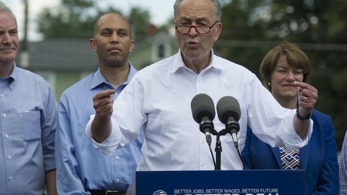 Senate Minority Leader Chuck Schumer of N.Y., accompanied by Congressional Democrats, speaks in Berryville, Va., Monday, July 24, 2017, to unveil their new agenda. From left are, Sen. Chris Van Hollen, D-Md., Rep. Hakeem Jeffries, D-N.Y., Schumer, and Sen. Amy Klobuchar, D-Minn.