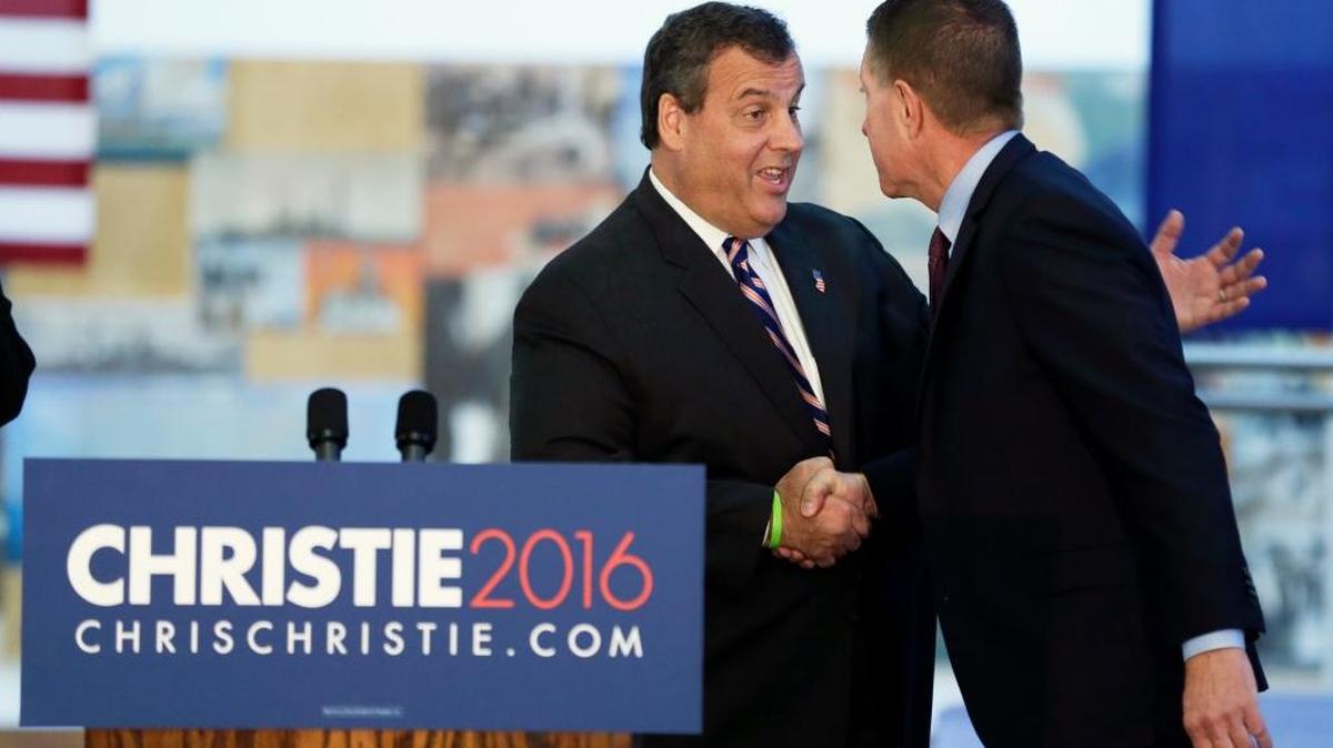 
Republican presidential candidate, New Jersey Gov. Chris Christie greets supporter Bruce Rastetter, right, during a news conference Tuesday.
