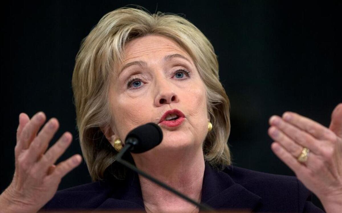 FILE - In this Oct. 22, 2015 file photo, Democratic presidential candidate former Secretary of State Hillary Rodham Clinton testifies on Capitol Hill in Washington before the House Select Committee on Benghazi. Clinton never personally denied any requests from diplomats for additional security at the U.S. outpost in Benghazi, Libya, according to Democrats on a select House panel who absolved the former secretary of state and the U.S. military of wrongdoing in the deadly Sept. 11, 2012 attacks.