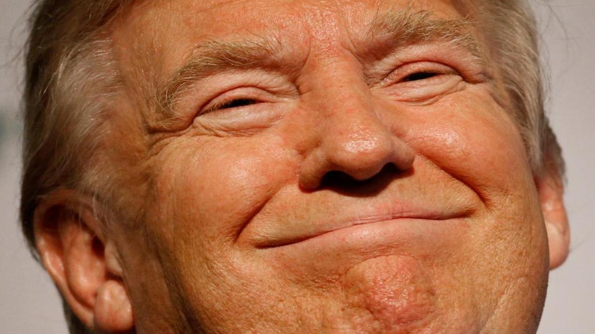 In this Jan. 19, 2016, photo, Donald Trump smiles after speaking at the Iowa Renewable Fuels Summit in Altoona, Iowa. Trump and some mainstream Republicans are engaged in a long-distance flirtation. Both sides are coming to the realization that they'll need each other if the billionaire businessman becomes the party's presidential nominee.