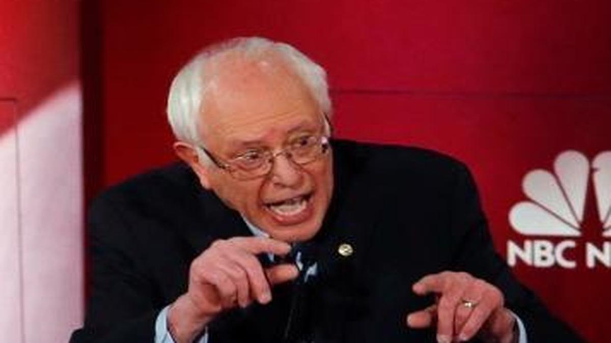 Democratic presidential candidate Sen. Bernie Sanders responds energetically to former Secretary of State Hiullary Clinton during Sunday’s debate.