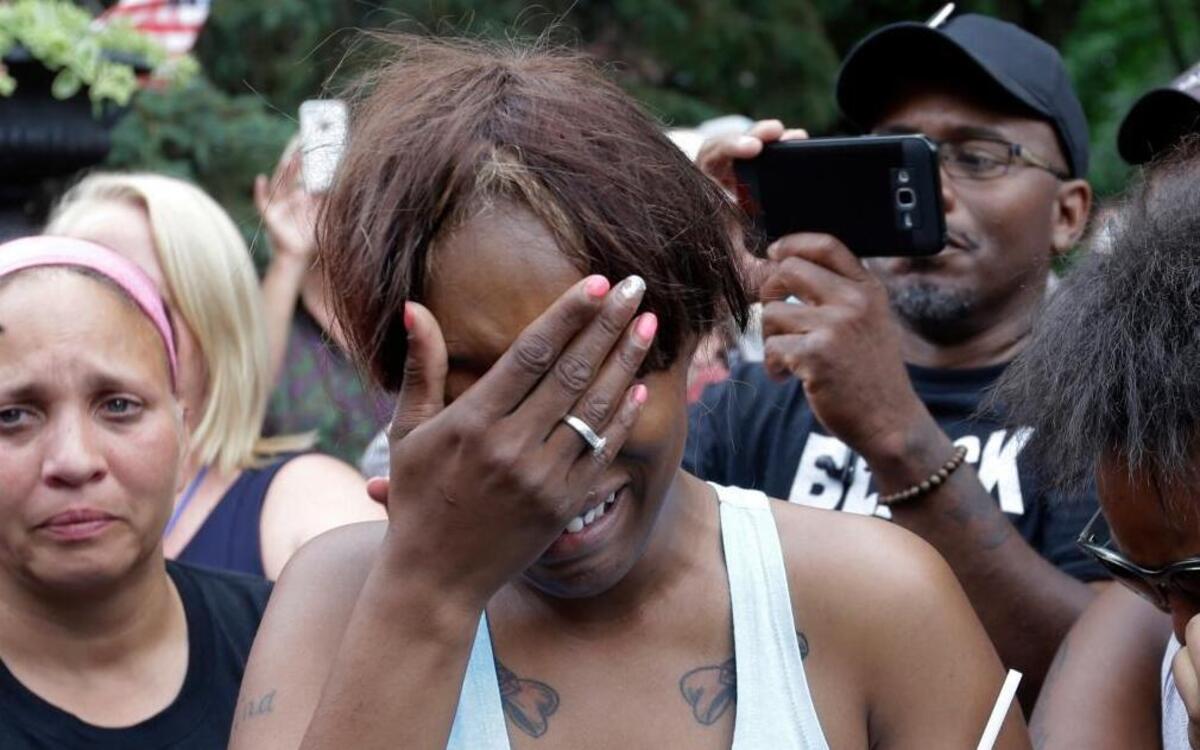 Diamond Reynolds, the girlfriend of Philando Castile of St. Paul, cries outside the governor's residence in St. Paul, Minn., on Thursday, July 7, 2016. Castile was shot and killed after a traffic stop by police. A video shot by Reynolds of the shooting went viral.