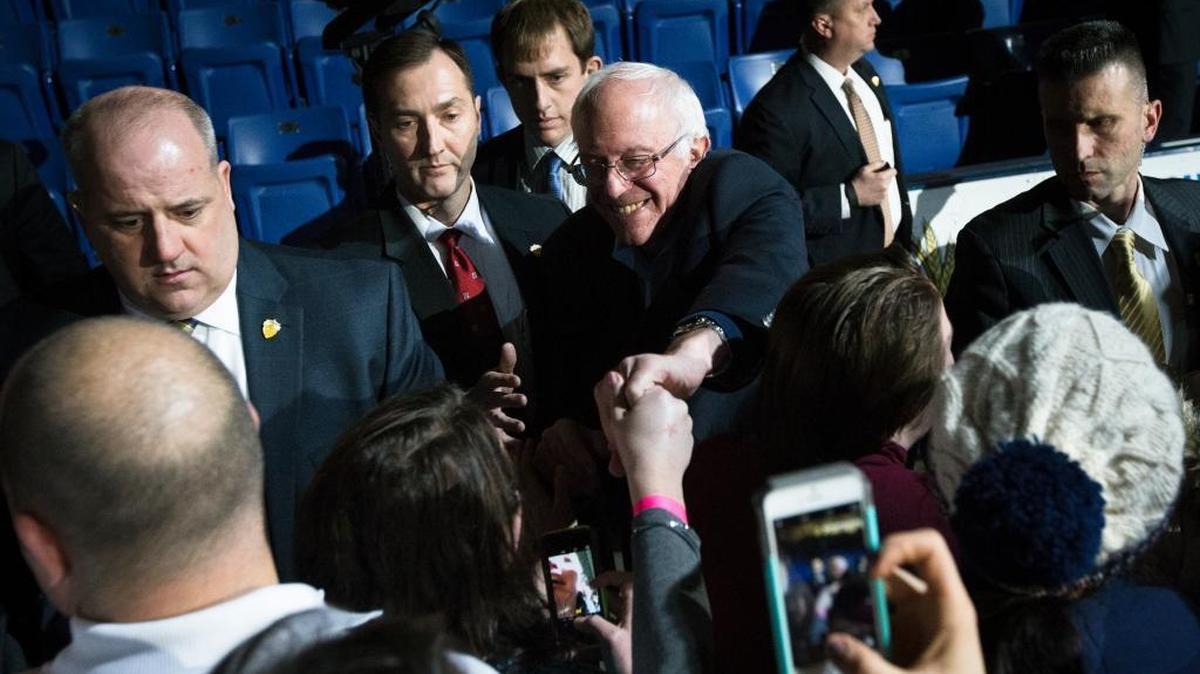 Democratic presidential candidate Sen. Bernie Sanders, I-Vt., shakes hands with attendees during a campaign stop at the University of New Hampshire Whittemore Center Arena, Monday.