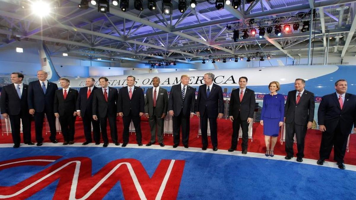 
Republican presidential candidates, from left, former Pennsylvania Sen. Rick Santorum, former New York Gov. George Pataki, Sen. Rand Paul, R-Ky., former Arkansas Gov. Mike Huckabee, Sen. Marco Rubio, R-Fla., Sen. Ted Cruz, R-Texas, retired neurosurgeon Ben Carson, businessman Donald Trump, former Florida Gov. Jeb Bush, Wisconsin Gov. Scott Walker, businesswoman Carly Fiorina, Ohio Gov. John Kasich, and New Jersey Gov. Chris Christie take the stage during the CNN Republican presidential debate at the Ronald Reagan Presidential Library and Museum on Wednesday, Sept. 16, 2015, in Simi Valley, Calif.
