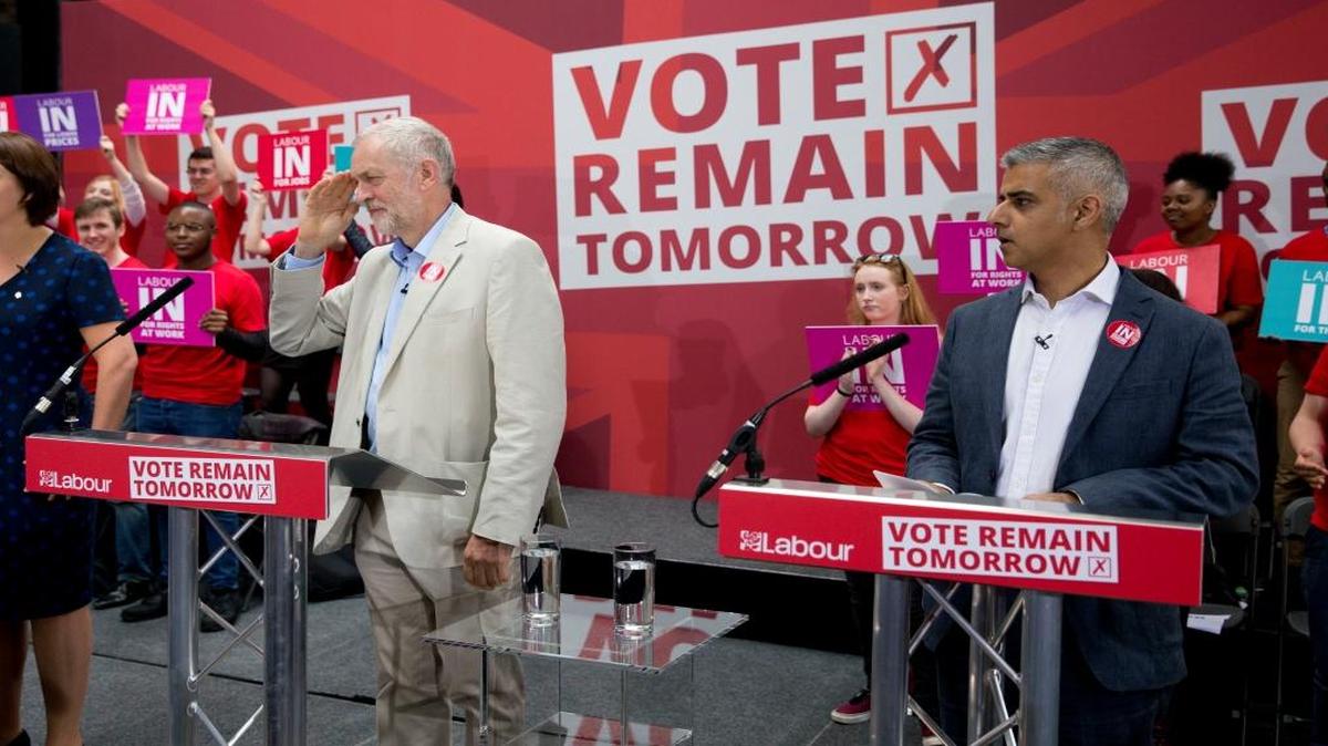 The leader of Britain's opposition Labour Party, Jeremy Corbyn, left, and London Mayor Sadiq Khan arrive onstage for a European Referendum "Remain" rally in London on Wednesday, June 22, 2016.