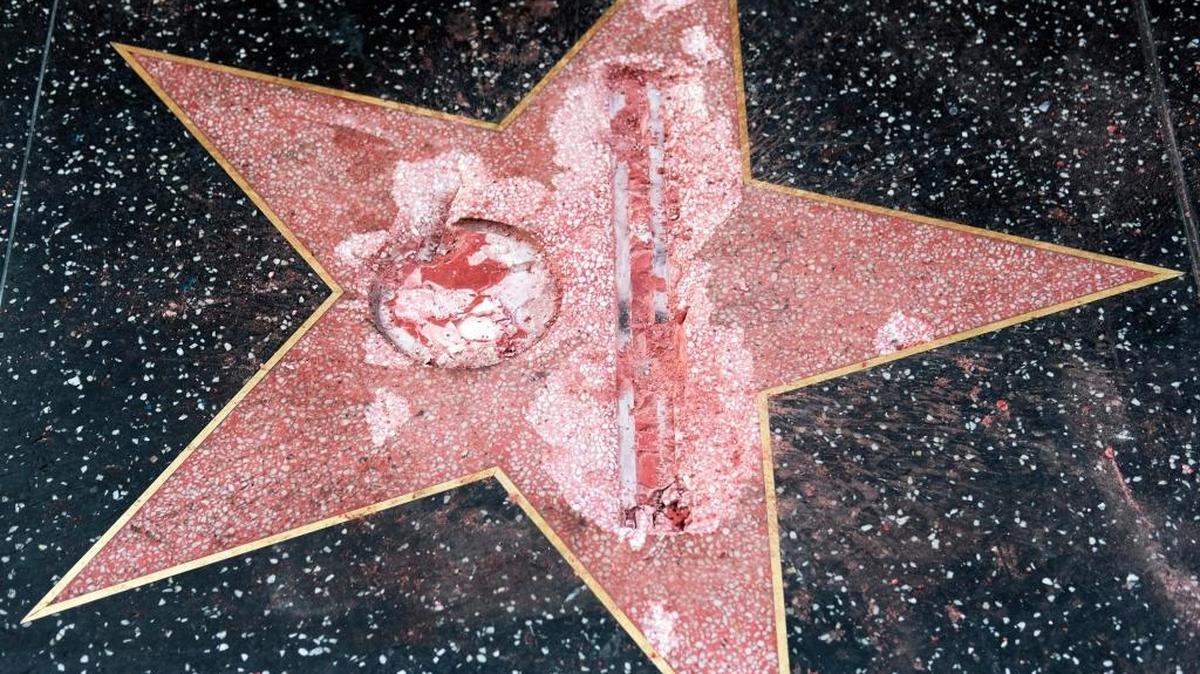 The vandalized star for Republican presidential candidate Donald Trump is seen on the Hollywood Walk of Fame on Wednesday in Los Angeles. Detective Meghan Aguilar said investigators were called to the scene before dawn Wednesday following reports that Trump’s star was destroyed by blows from a hammer.