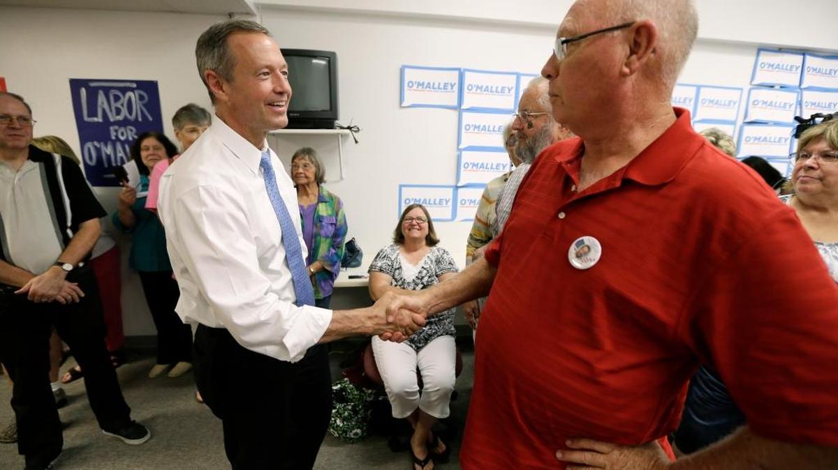 
Democratic presidential candidate, former Maryland Gov. Martin O'Malley, greets supporters during the opening of his Cedar Rapids Field Office, Wednesday, Aug. 5, 2015, in Cedar Rapids, Iowa. 
