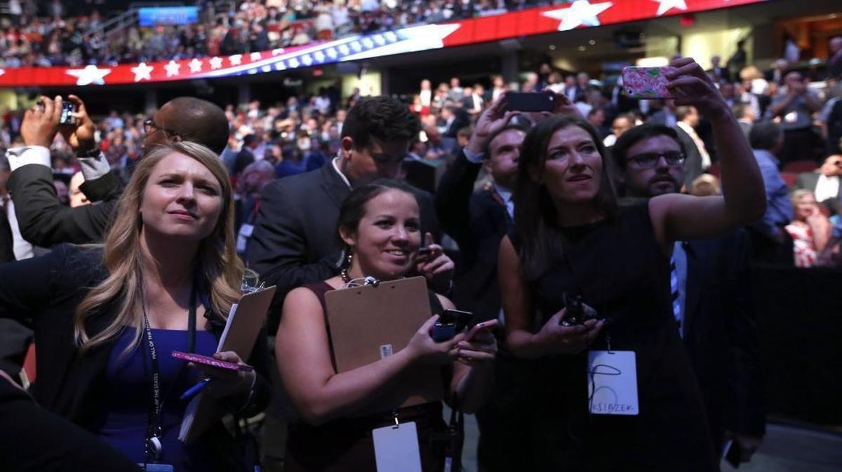 People listen during the first Republican presidential debate at the Quicken Loans Arena on Aug. 6, 2015, in Cleveland, Ohio.