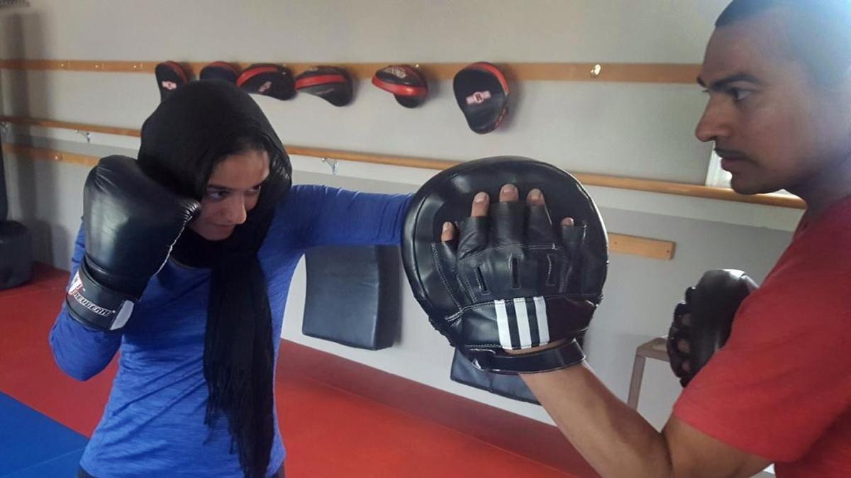 Uzma Shariff trains with her coach at a gym in Chicago. Shariff, a Muslim practitioner of jiujitsu and other martial arts, has received several requests for self-defense classes from fellow Muslim women who are concerned about anti-Muslim hostility in the wake of the election.