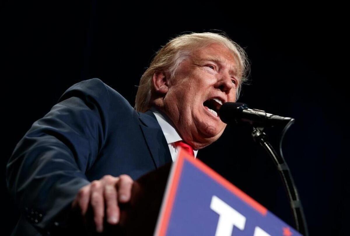 File-This Oct. 5, 2016, file photo shows Republican presidential candidate Donald Trump speaking during a campaign rally, in Reno, Nev.