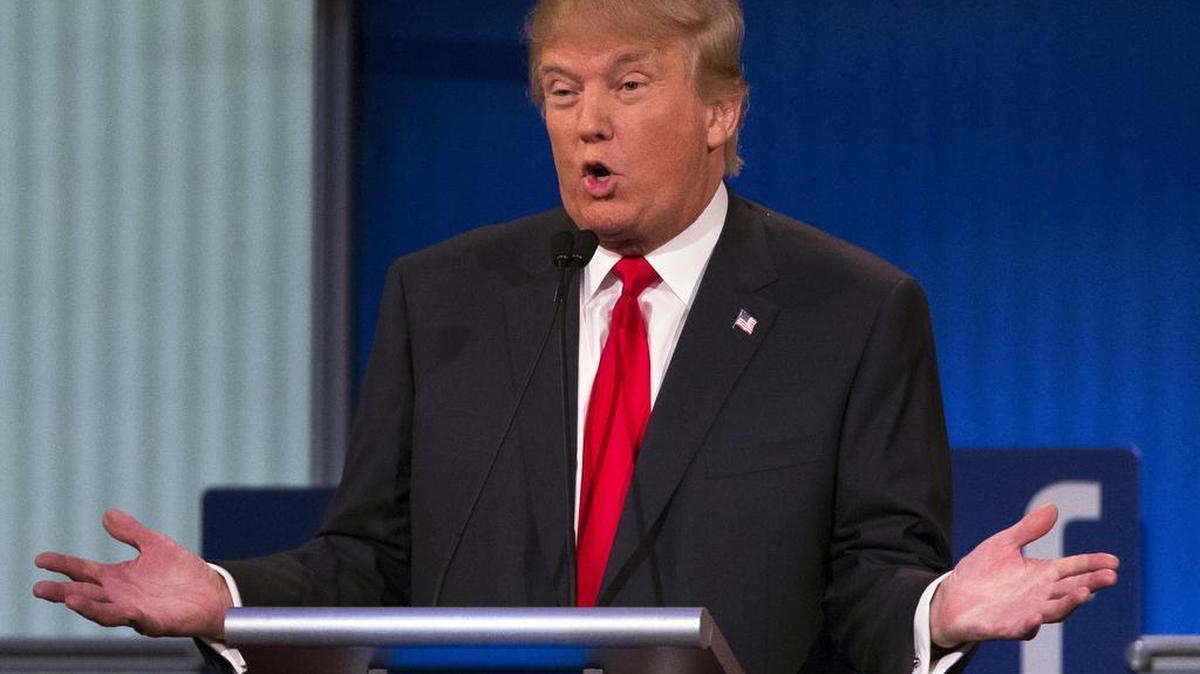 Republican presidential candidate Donald Trump gestures during the first Republican presidential debate at the Quicken Loans Arena Thursday, Aug. 6, 2015, in Cleveland.