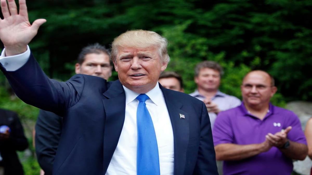 
Donald Trump waves as he arrives at a house party Tuesday, June 30, 2015, in Bedford, N.H.

